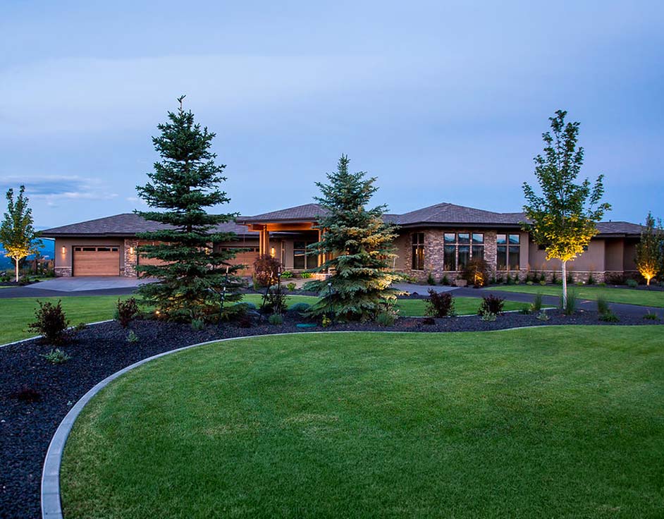 Custom home built in Spokane with beautiful green lawn in front